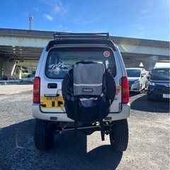 スズキ ジムニーJB23W リフトアップ、WORK大径タイヤ、ナビ、ETC、キャリア付の画像