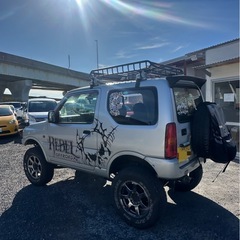 スズキ ジムニーJB23W リフトアップ、WORK大径タイヤ、ナビ、ETC、キャリア付の画像