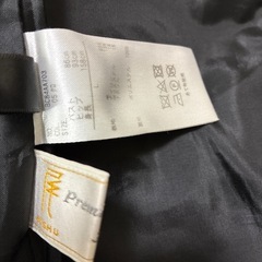 黒のコート　フード付きの画像