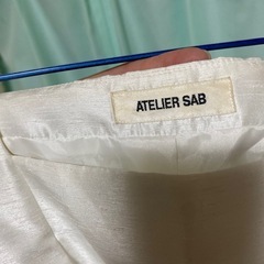 白の光沢ワンピースの画像