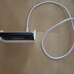 UQモバイル ポケットWiFiとクレードルの画像