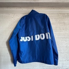 NIKE ウィンドブレーカー フード付きの画像