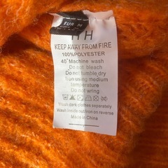 ふわふわたっぷりモヘア風オレンジのカーディガンの画像