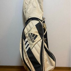 MIZUNOブランドの10本のアイアンセットとadidas製キャディバッグのセット。の画像