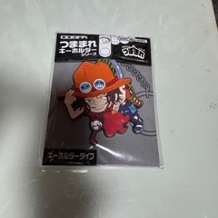 ワンピースパズルとシールとキーホルダーの3点セットの画像