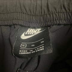 NIKE ウーブンテーパードパンツ XLの画像