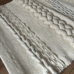 unico アイボリー編み込みウォールタペストリーの画像