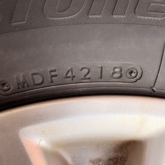 返スタッドレスタイヤ 4本 155/65/14の画像