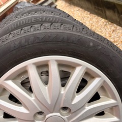 返スタッドレスタイヤ 4本 155/65/14の画像