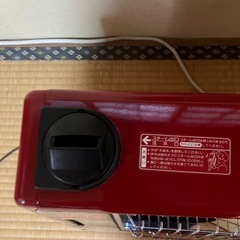 昭和レトロ　電気ストーブの画像