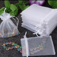 造花の花びらとフェザーとメッシュバックのセットの画像