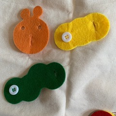 イモムシボタン練習用おもちゃの画像