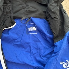 ノースフェイス　ウィンドブレーカーの画像