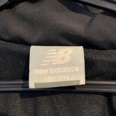 ニューバランスベンチコートの画像