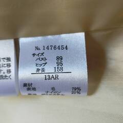 アイボリーのコートの画像