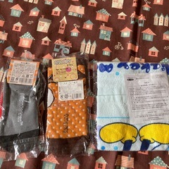 ムーミン、スヌーピー、ソックスとミッキーマウスタオルの画像