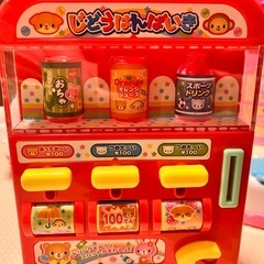 お取引中　メルちゃんお世話セットと自販機のおもちゃの画像