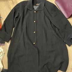 コート黒の画像