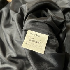 コート黒の画像