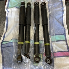 【中古】JB64ジムニー用純正足廻り　取説ありません　左右純正リーディングアームアクスルサイドブッシングありませんの画像