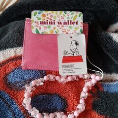スヌーピーmini財布とケイタイストラップの画像