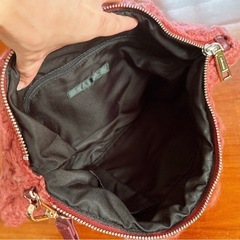 ニット🧶クラッチバッグの画像