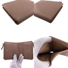 プラダ PRADA 二つ折り財布 カーフスキン ロゴ ヴィッテロムーブ ベージュの画像