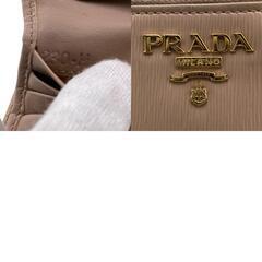 プラダ PRADA 二つ折り財布 カーフスキン ロゴ ヴィッテロムーブ ベージュの画像