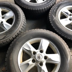 TOYOTA ランクル100 純正18インチアルミ、ダンロップ スタッドレス付 4本の画像