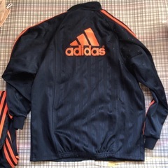 adidas CUMULATE　ジャージ上下セット 黒/オレンジの画像