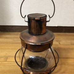 アンティーク調のランプ型貯金箱の画像