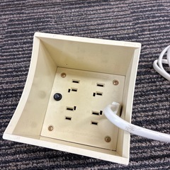 スイッチつきのレトロな延長コードの画像