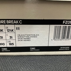 新品未使用adidasスニーカーの画像