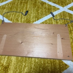 猫用ケージに引っ掛けられる台の画像