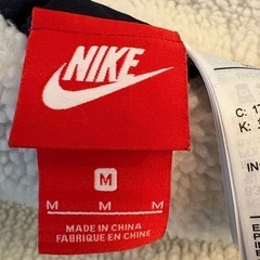 NIKE リバーシブルダウン　メンズMの画像