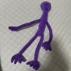 細長い生き物のぬいぐるみの画像