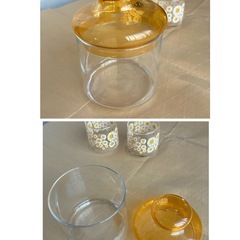 レトロな花柄コップとガラスキャニスターの画像