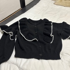 厚手のカーディガンの画像