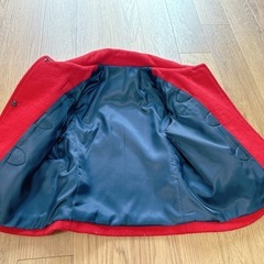 赤のコートの画像