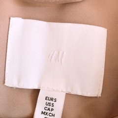 ベルト付きトレンチコートの画像