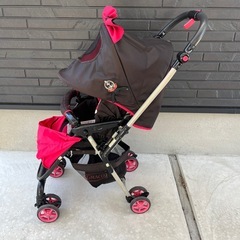 ミニー風リボンのベビーカーの画像