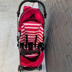 ミニー風リボンのベビーカーの画像