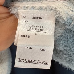 水色　チェックのセーター の画像