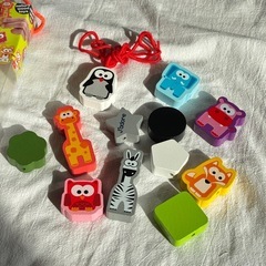 jadore木製紐通しの画像