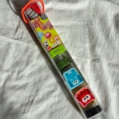 jadore木製紐通しの画像