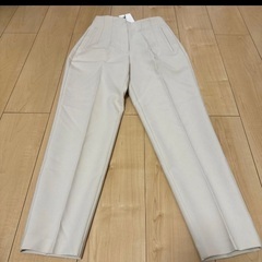 新品タグ付き　スラックスの画像