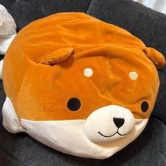 スヌーピーの被り物とぬいぐるみの画像