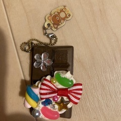 リラックマのぬいぐるみとキーホルダーの画像