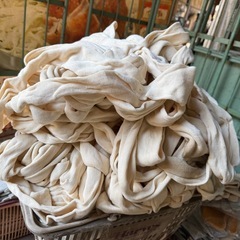 筒状のメリヤス生地の山、
差し上げますの画像