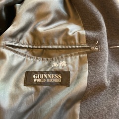 メンズダークグレーロングコートの画像